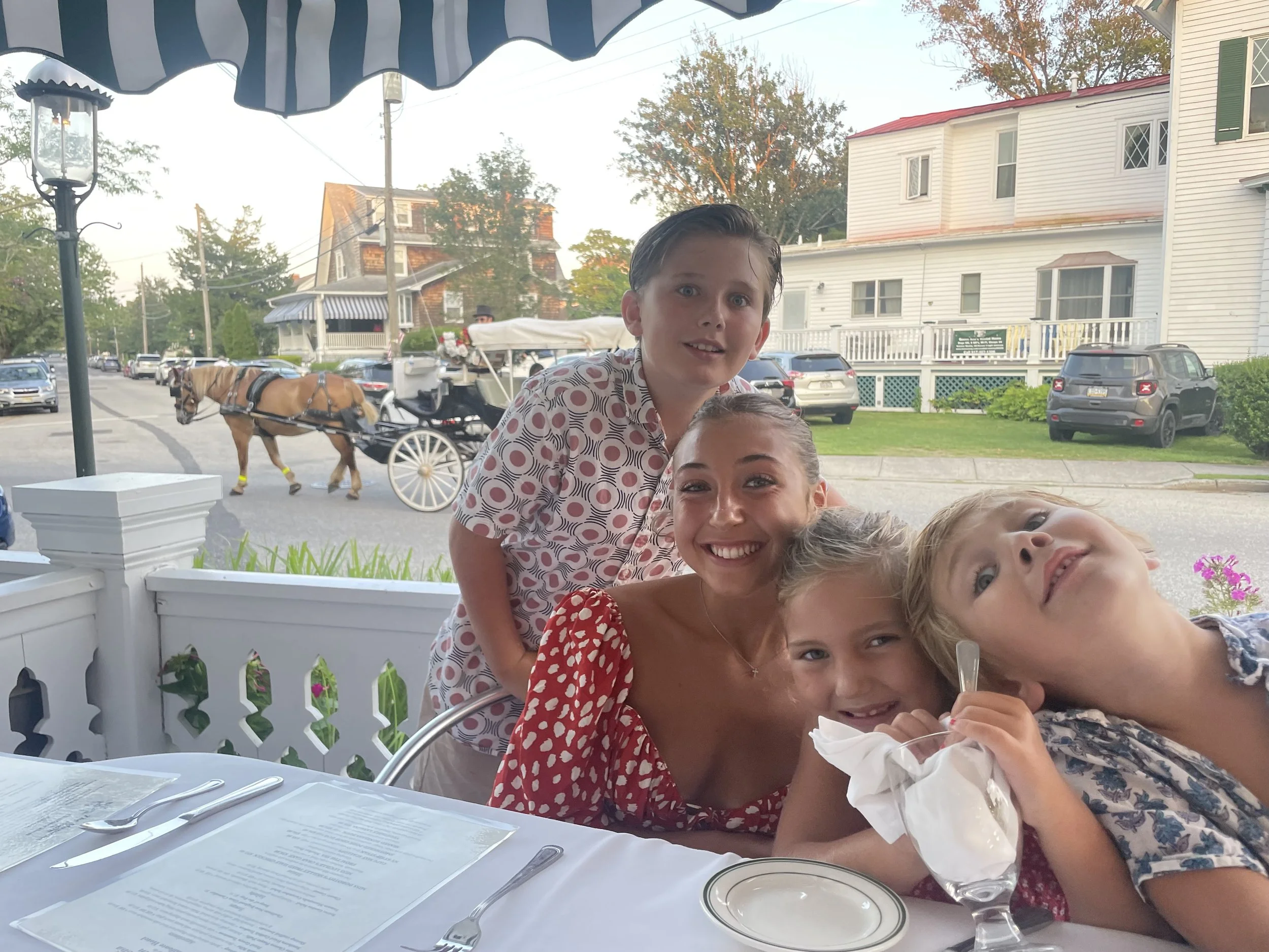 Kids crafting together at a low table